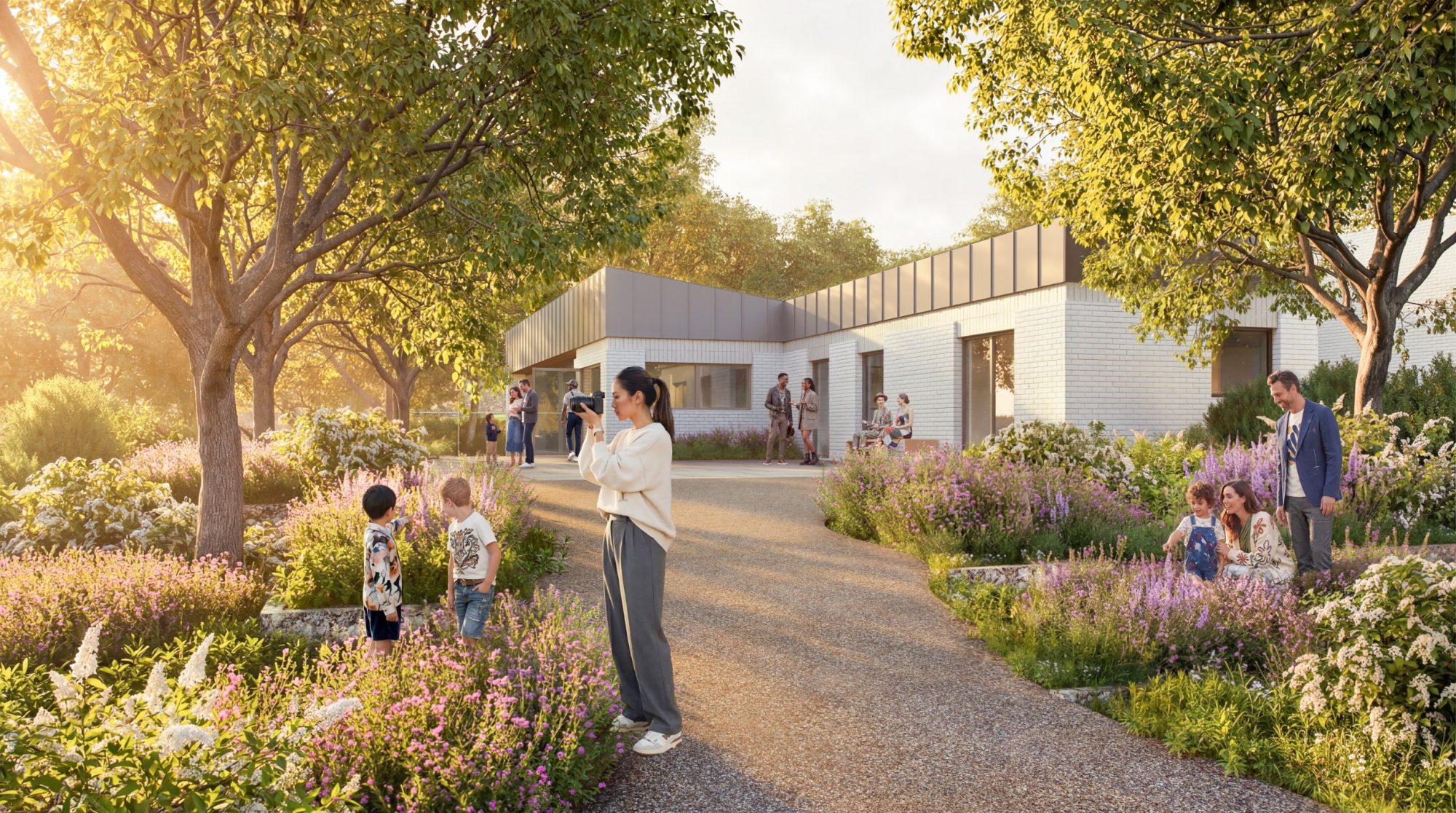 Rendering of Hathill House at Goodwood Art Foundation, a low white-brick building in a garden path lined with wildflowers and trees, with visitors outside